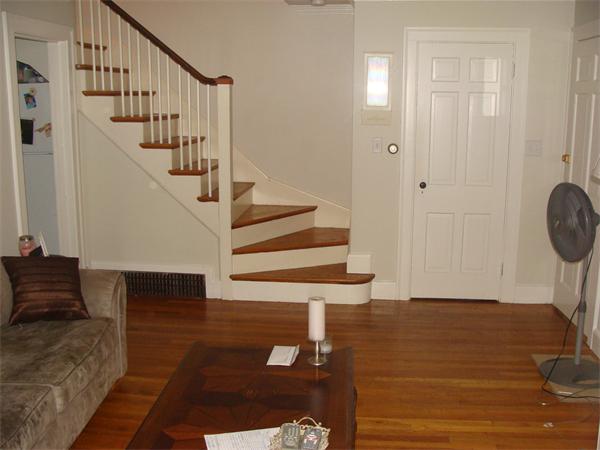 76 Cloverdale Road Newton, MA 02461 - Photo 6 of 14 a view of entryway and hall with wooden floor