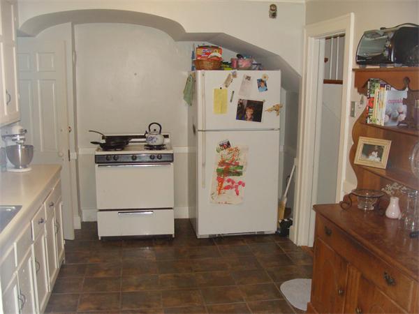 76 Cloverdale Road Newton, MA 02461 - Photo 9 of 14 a kitchen with stainless steel appliances granite countertop a refrigerator and a stove