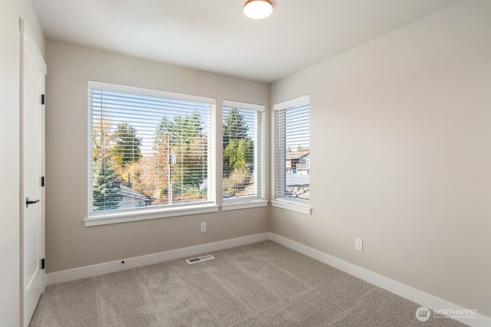 12814 66th Avenue South Seattle, WA 98178 - Photo 27 of 28 an empty room with windows