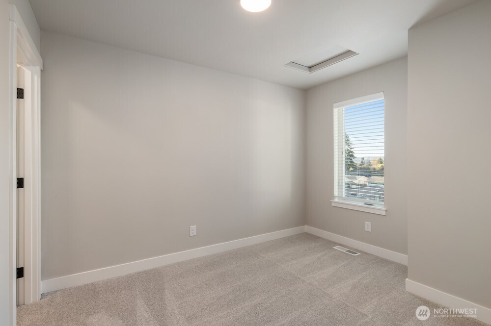 12814 66th Avenue South Seattle, WA 98178 - Photo 28 of 28 an empty room with windows