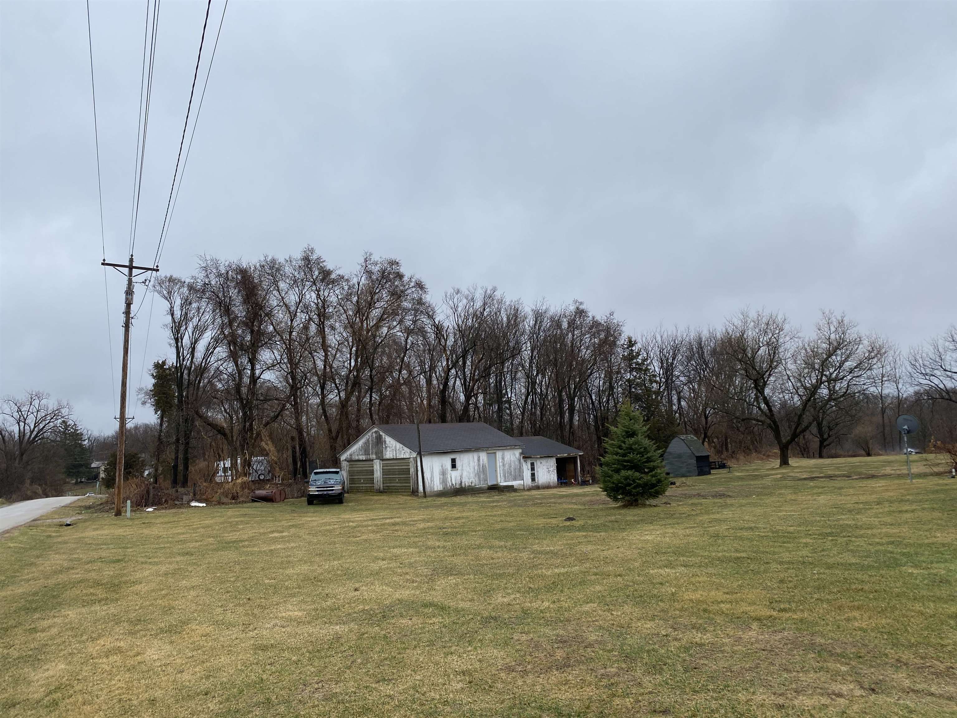 13448 Wacker Road Savanna, IL 61074 - Photo 1 of 11 a view of a town with large trees