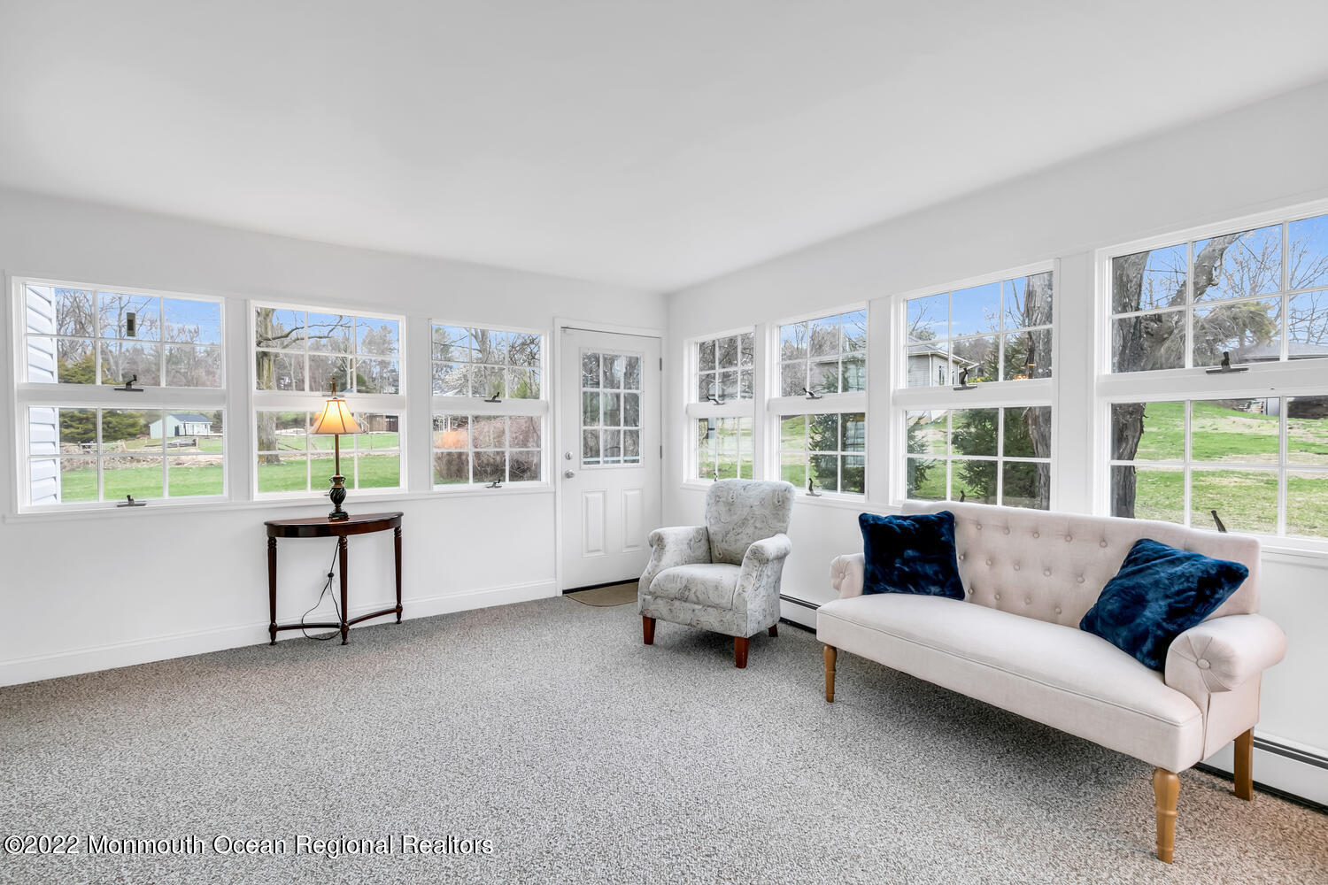 81 Dutch Lane Road Colts Neck, NJ 07722 - Photo 12 of 28 a living room with furniture and a large window
