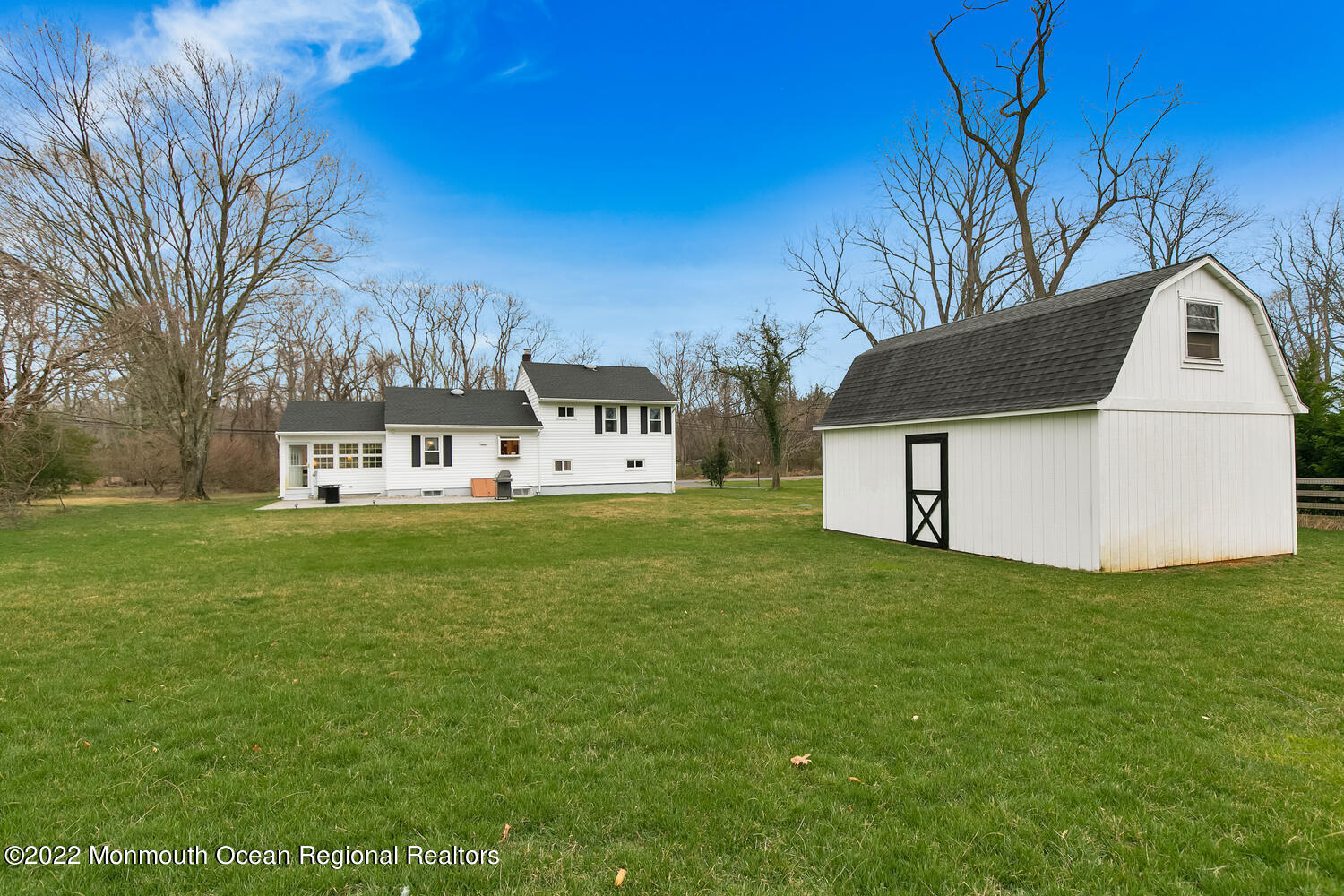 81 Dutch Lane Road Colts Neck, NJ 07722 - Photo 26 of 28 a front view of a house with a yard