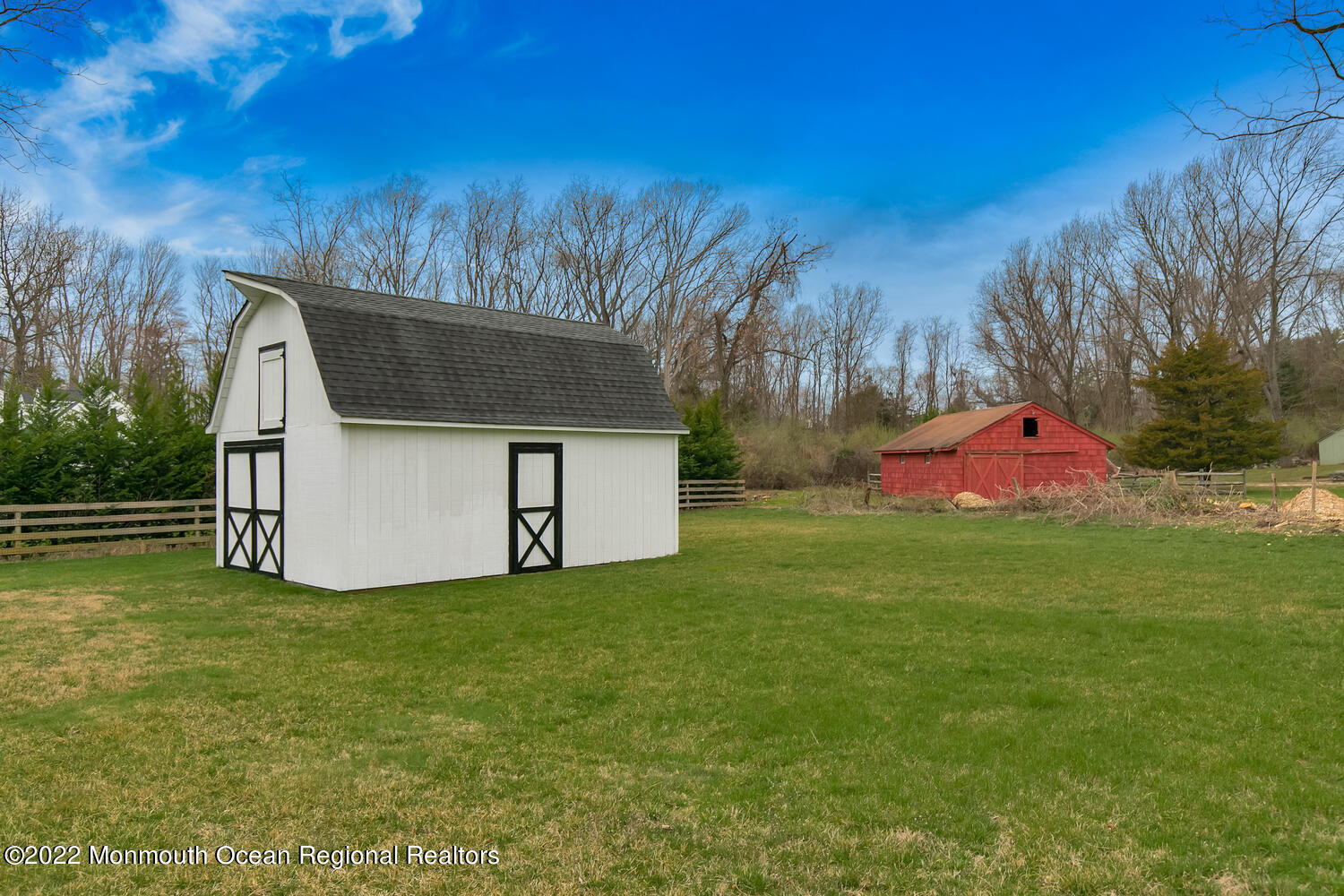 81 Dutch Lane Road Colts Neck, NJ 07722 - Photo 28 of 28 a white house that has a tree in front of it