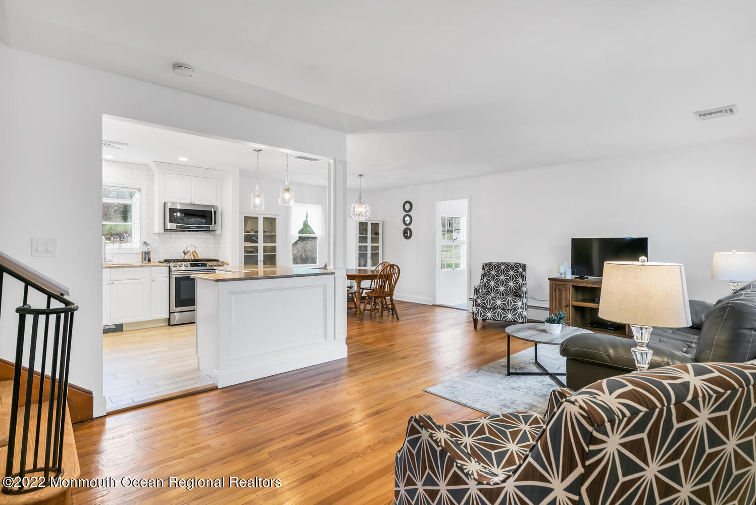 81 Dutch Lane Road Colts Neck, NJ 07722 - Photo 3 of 28 a living room with furniture and a table