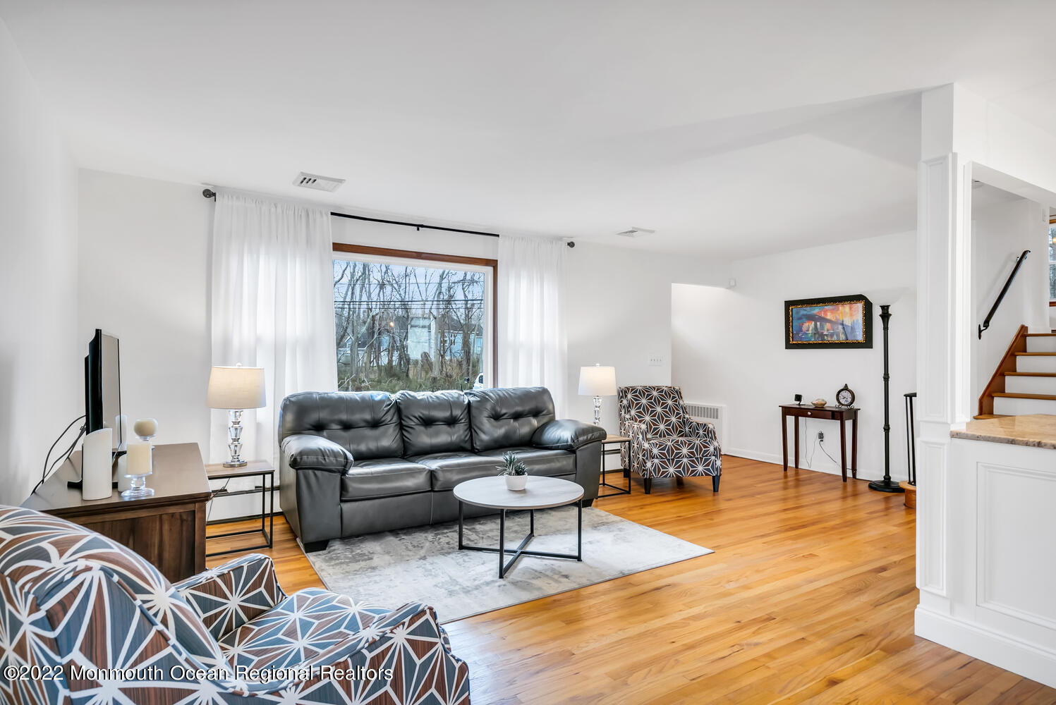 81 Dutch Lane Road Colts Neck, NJ 07722 - Photo 10 of 28 a living room with furniture and a window