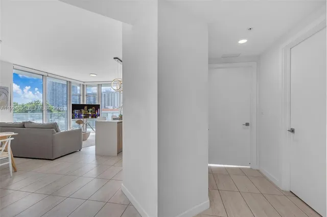 a kitchen with a sink and toilet