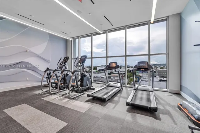 a view of a room with gym equipment