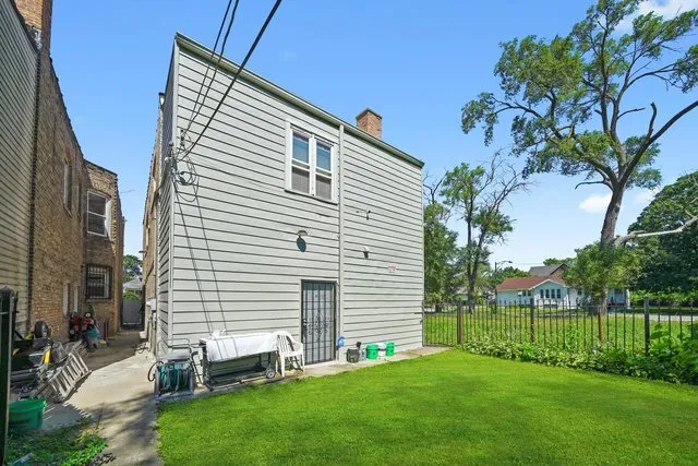 a backyard of a house with seating space