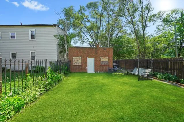 an aerial view of a house with a garden