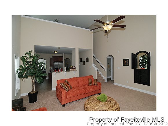 52 Regimental Drive Cameron, NC 28326 - Photo 5 of 12 a living room with furniture flowerpot and a potted plant