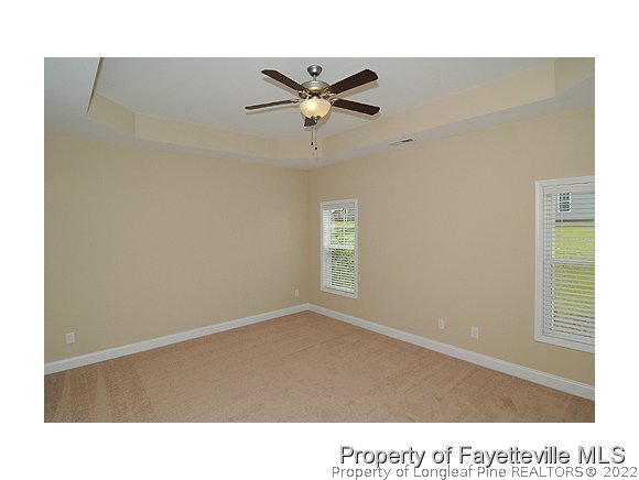 52 Regimental Drive Cameron, NC 28326 - Photo 6 of 12 a black and white photo of a ceiling fan