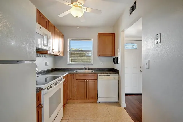 a view of a car parked in front of a building