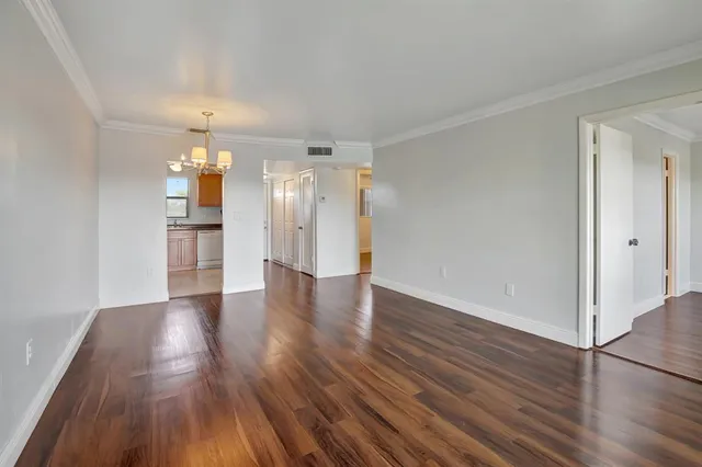 a view of a two chairs in the balcony