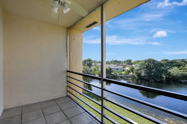 a view of a balcony with an outdoor space