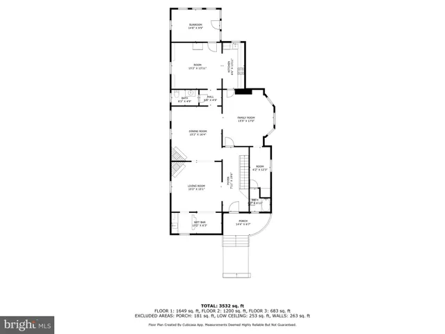 a picture of a bench in front of a building