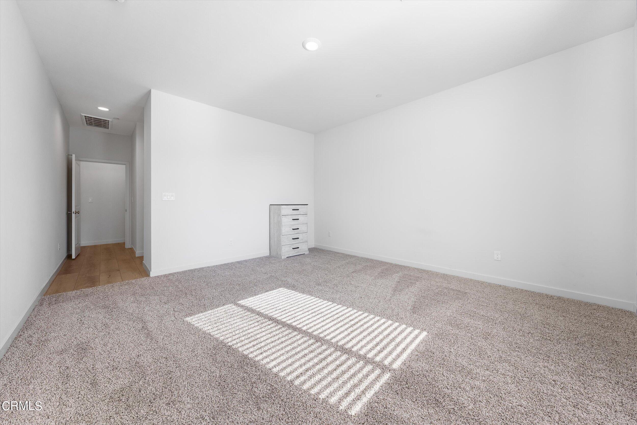 7405 Emerald Green Avenue Bakersfield, CA 93313 - Photo 21 of 39 a view of an empty room
