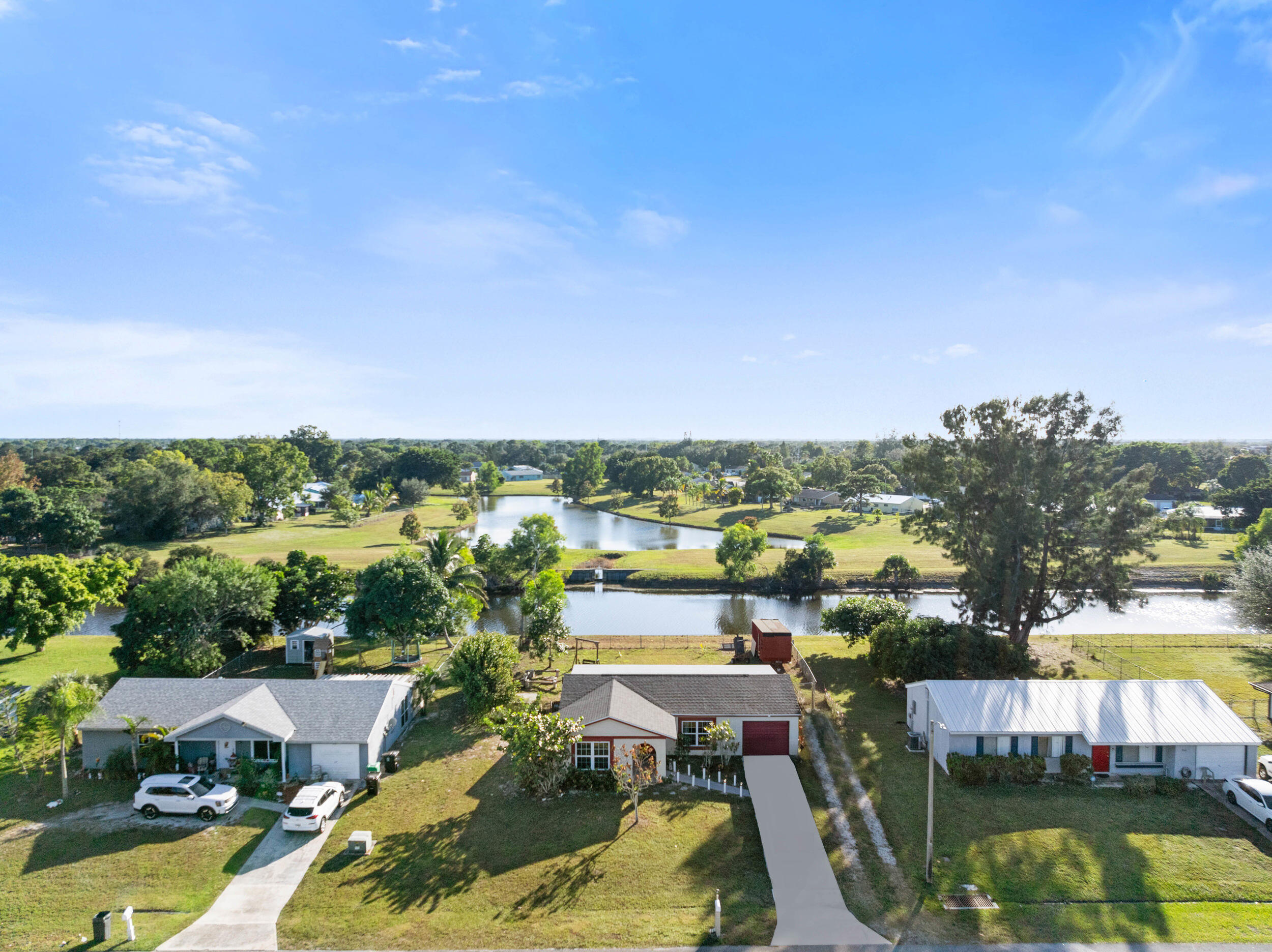 244 Southwest Cherryhill Road Port St. Lucie, FL 34953 - Photo 1 of 39 2_dji_20251201234801_0794_d