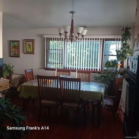 a view of a livingroom with furniture and windows