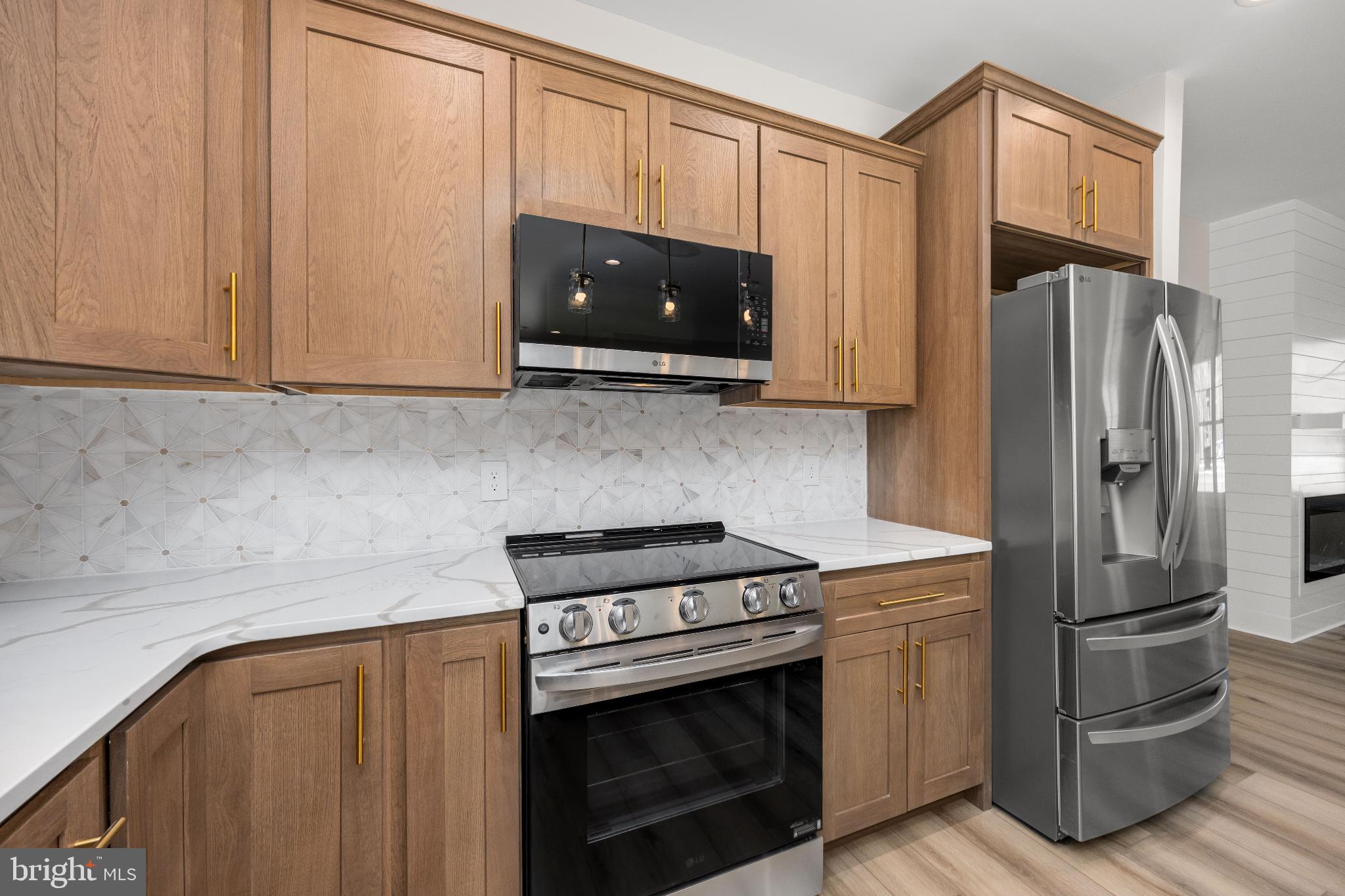 19438 Parsons Road Georgetown, DE 19947 - Photo 12 of 62 Modern kitchen with elegant wood cabinetry.
