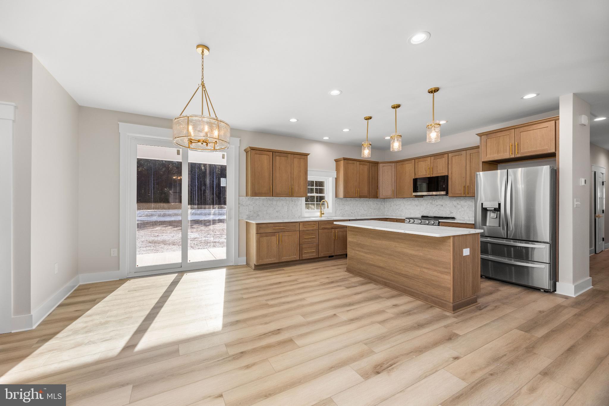 19438 Parsons Road Georgetown, DE 19947 - Photo 14 of 62 Bright and airy kitchen with modern finishes.