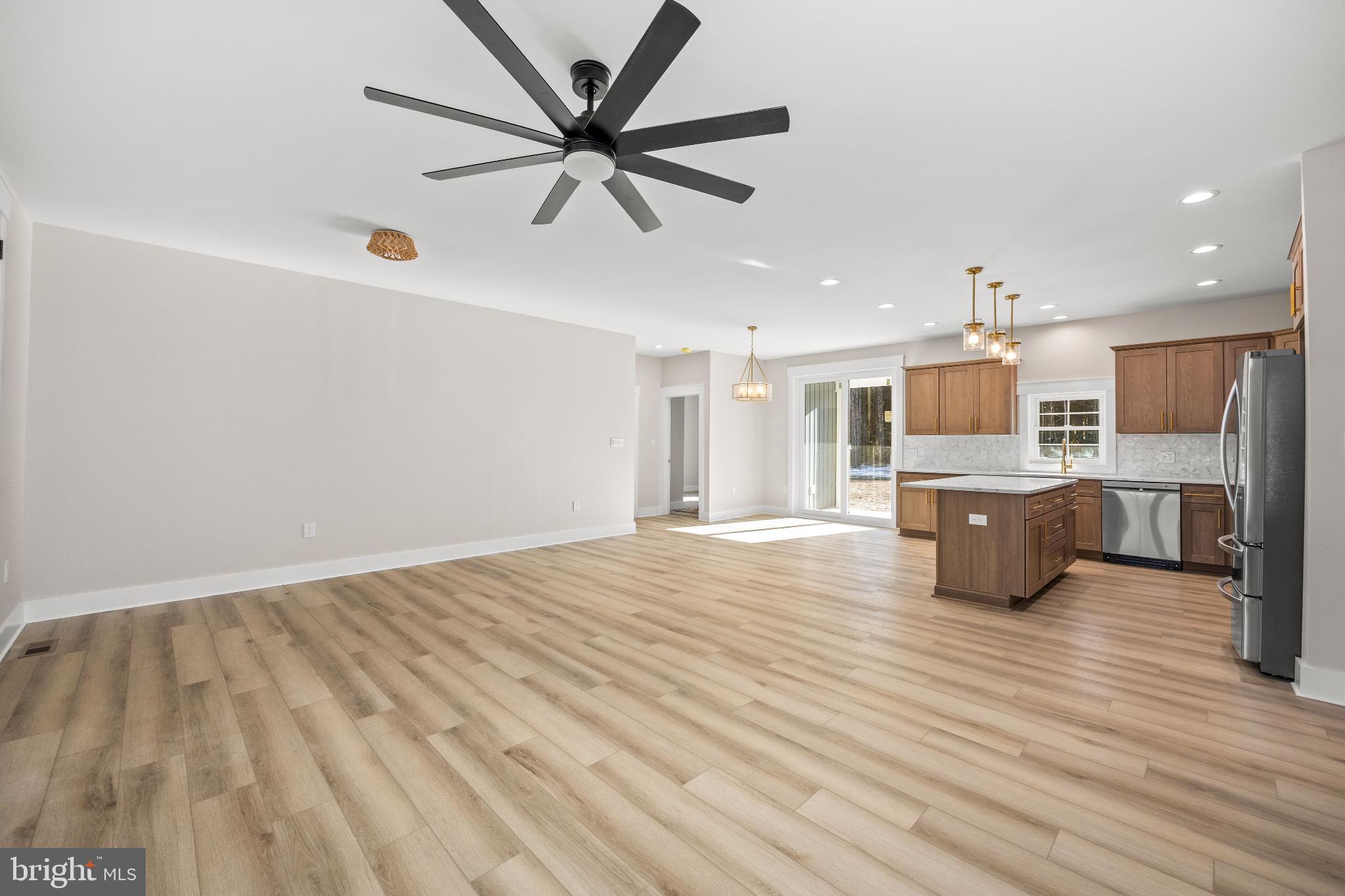 19438 Parsons Road Georgetown, DE 19947 - Photo 21 of 62 Spacious modern living area with natural light.
