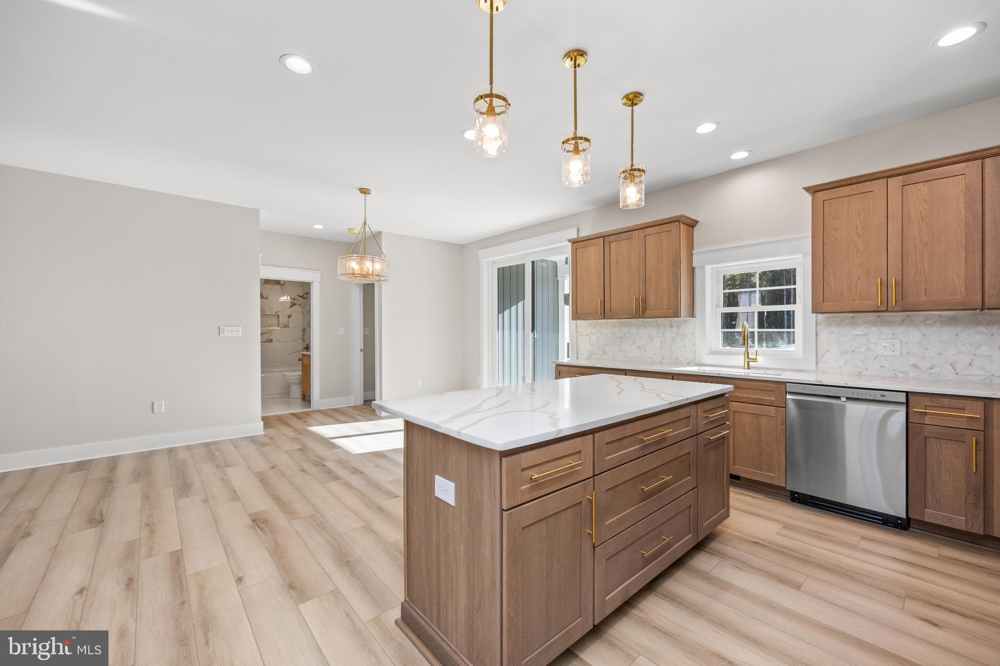 19438 Parsons Road Georgetown, DE 19947 - Photo 22 of 62 Bright and modern kitchen with elegant finishes.