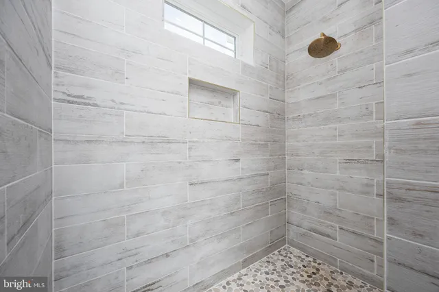view of a bathroom from a hallway with toilet
