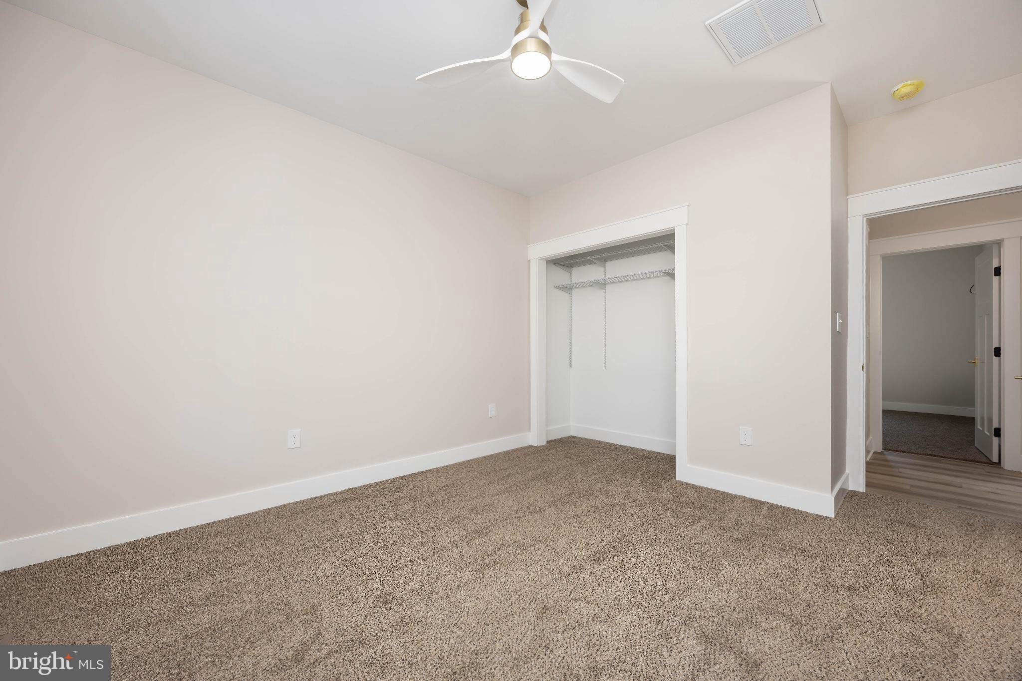 19438 Parsons Road Georgetown, DE 19947 - Photo 50 of 62 Spacious, light-filled room with soft carpet.