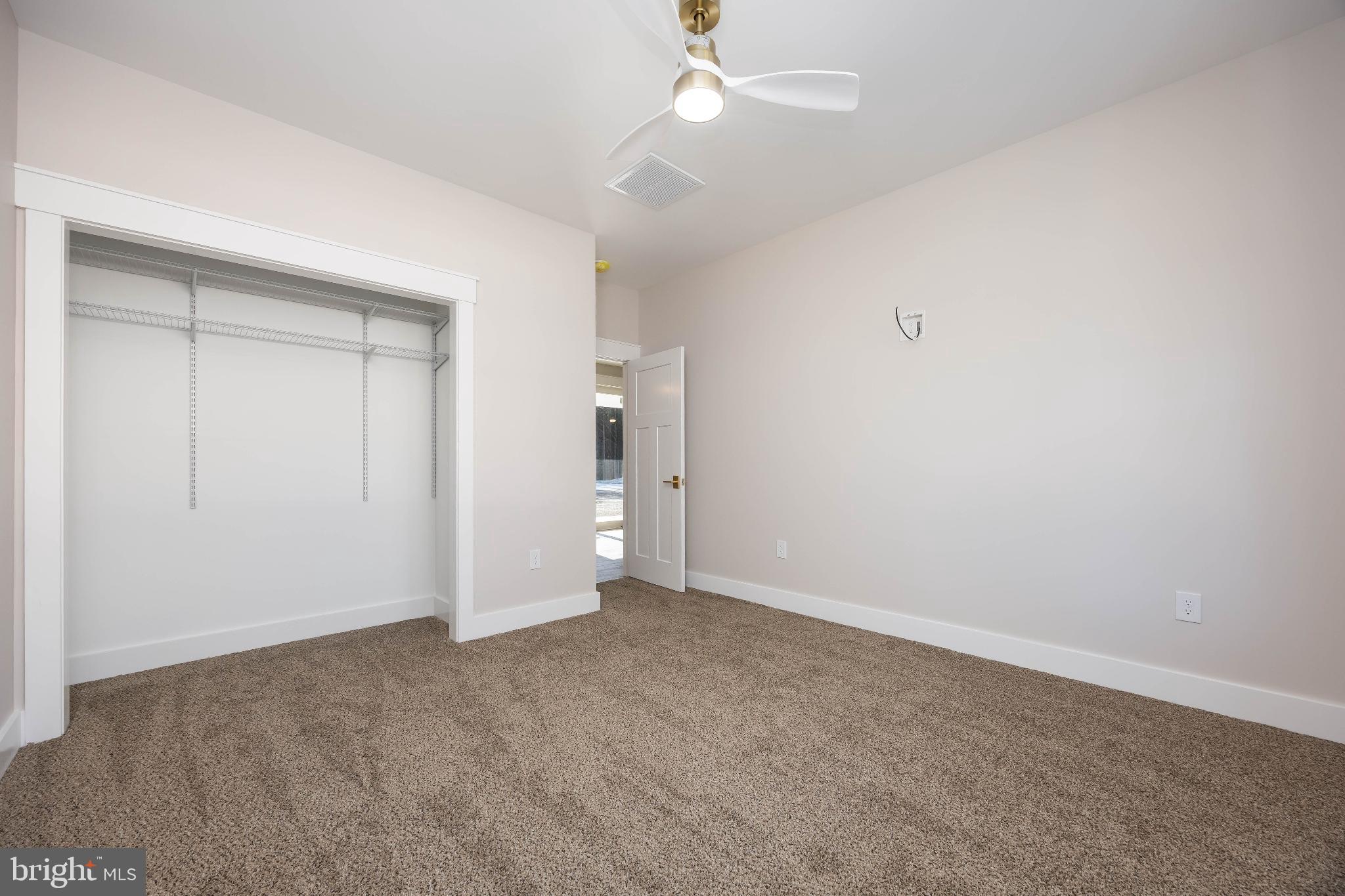 19438 Parsons Road Georgetown, DE 19947 - Photo 51 of 62 Spacious, light-filled bedroom retreat.