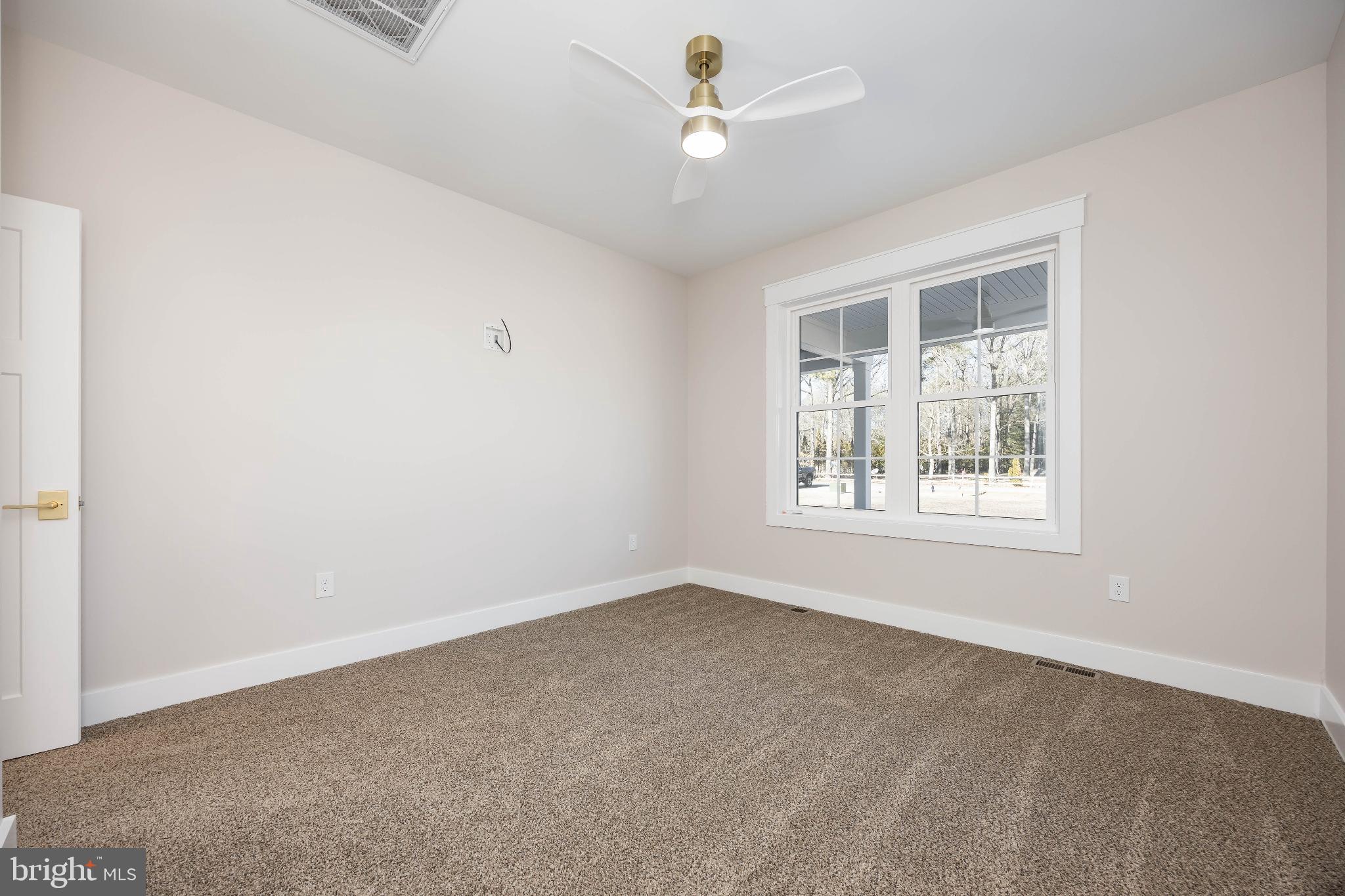 19438 Parsons Road Georgetown, DE 19947 - Photo 52 of 62 Bright and airy room with natural light.