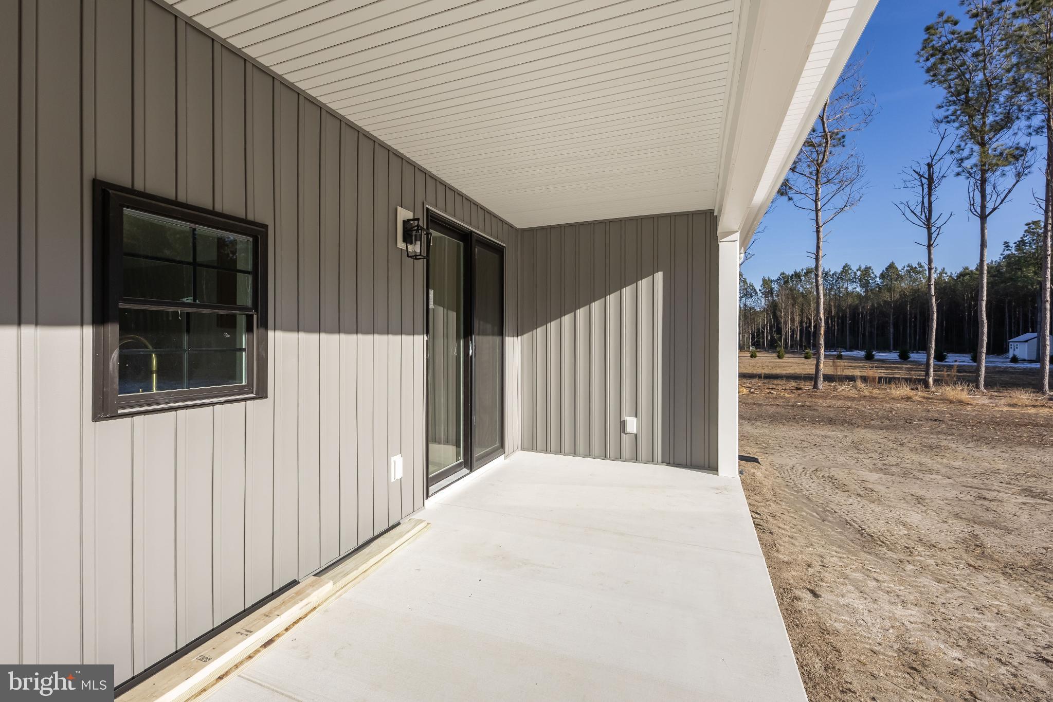 19438 Parsons Road Georgetown, DE 19947 - Photo 56 of 62 Modern entryway with serene outdoor views.