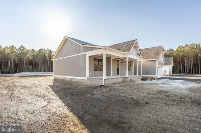 an entrance to house with yard
