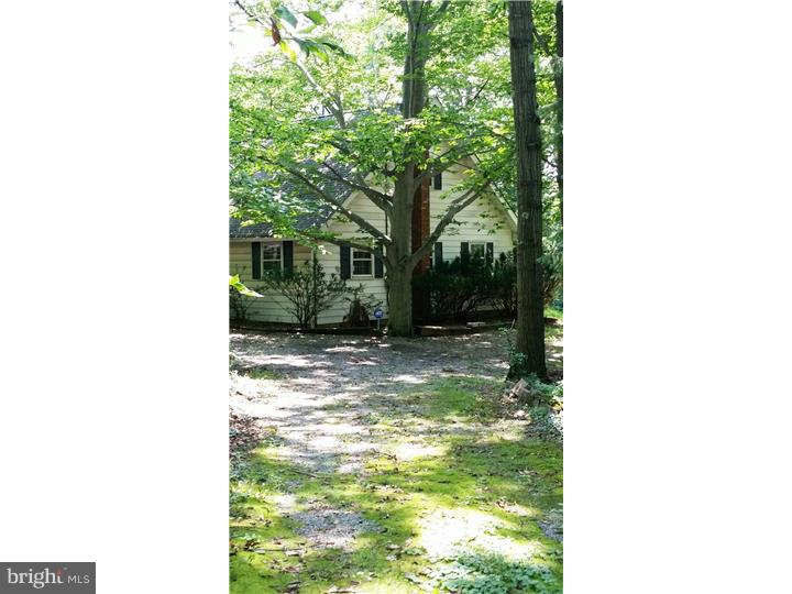 9 Stone Hill Road Allentown, NJ 08501 - Photo 1 of 24 a view of a porch with a tree