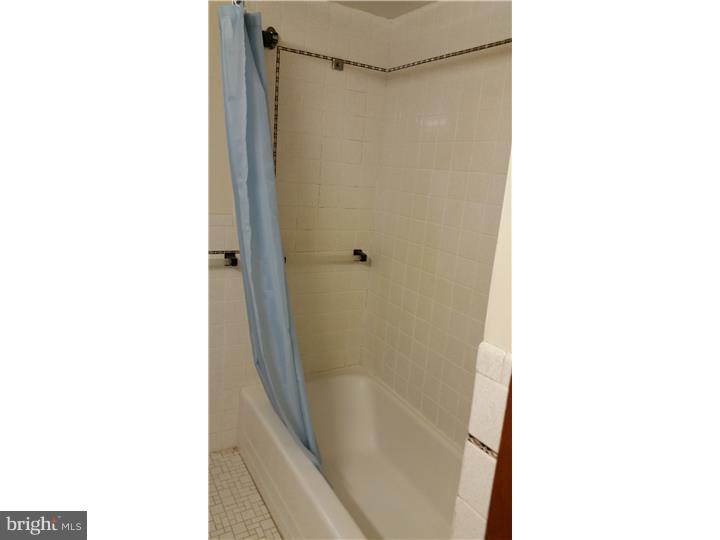 9 Stone Hill Road Allentown, NJ 08501 - Photo 12 of 24 a bathroom with a shower and a room