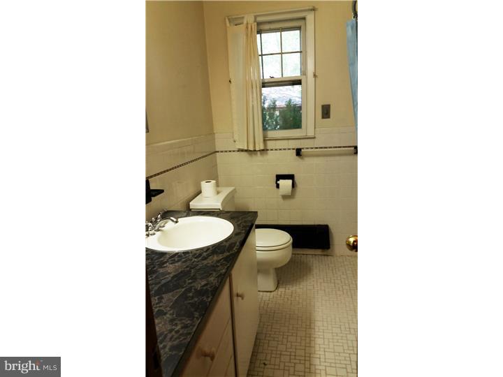 9 Stone Hill Road Allentown, NJ 08501 - Photo 13 of 24 a bathroom with a sink and a mirror