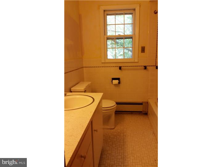 9 Stone Hill Road Allentown, NJ 08501 - Photo 14 of 24 a bathroom with a granite countertop toilet and a sink