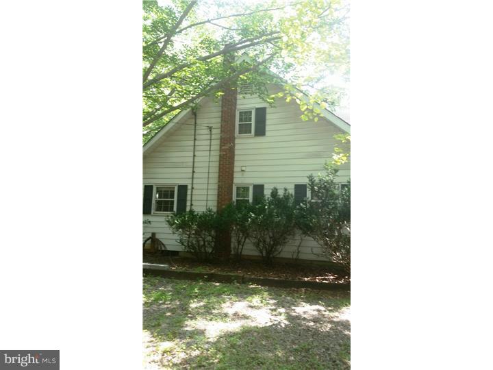9 Stone Hill Road Allentown, NJ 08501 - Photo 4 of 24 a backyard of a house