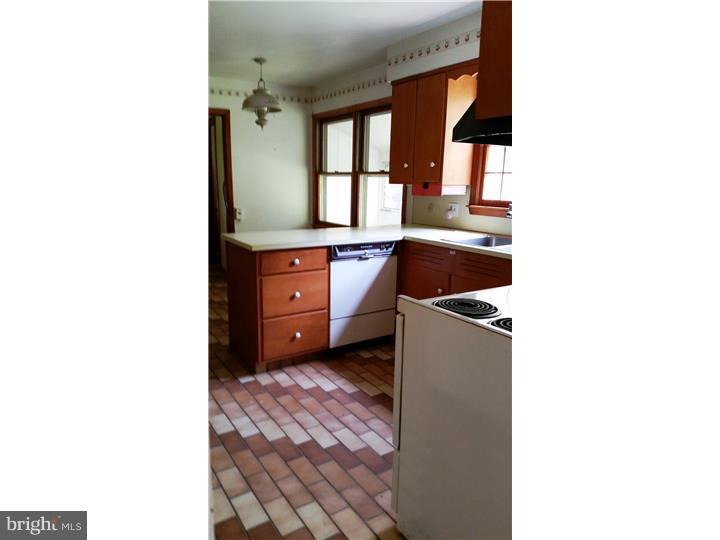 9 Stone Hill Road Allentown, NJ 08501 - Photo 6 of 24 a room with a cabinet and a window
