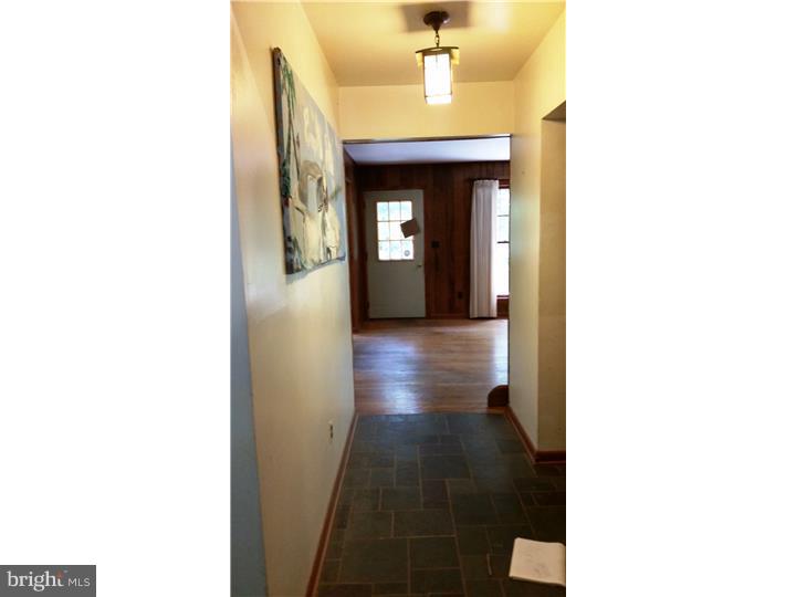 9 Stone Hill Road Allentown, NJ 08501 - Photo 9 of 24 a view of a hallway with wooden floor