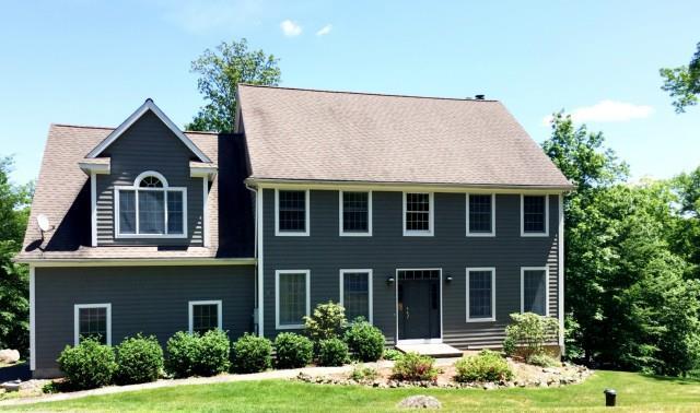 23 Bonny Road Brookfield, CT 06804 - Photo 1 of 1 a front view of a house with yard and garage