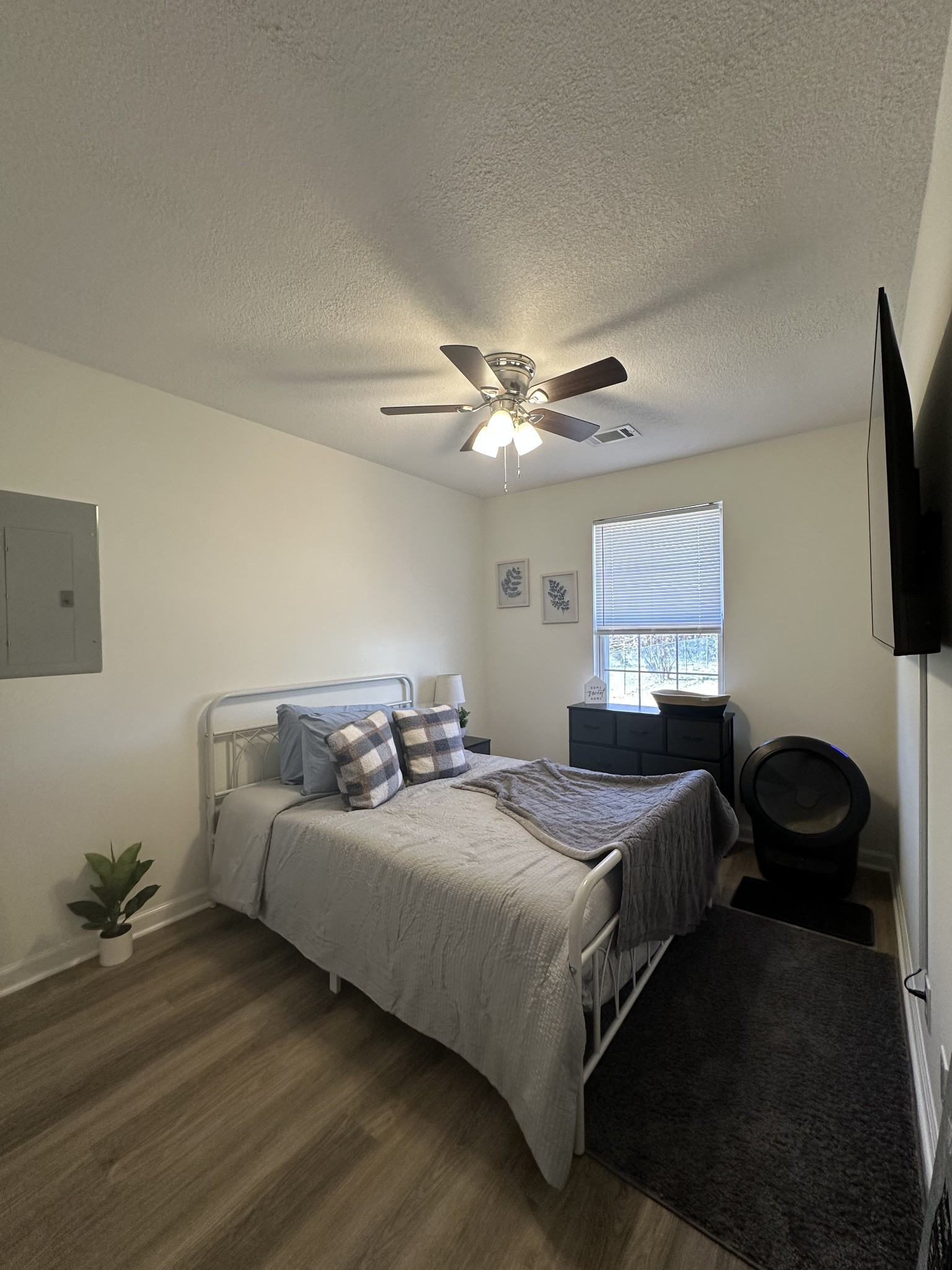 1027 Shadow Ridge Avenue Oak Grove, KY 42262 - Photo 11 of 14 a bedroom with a bed and a flat screen tv