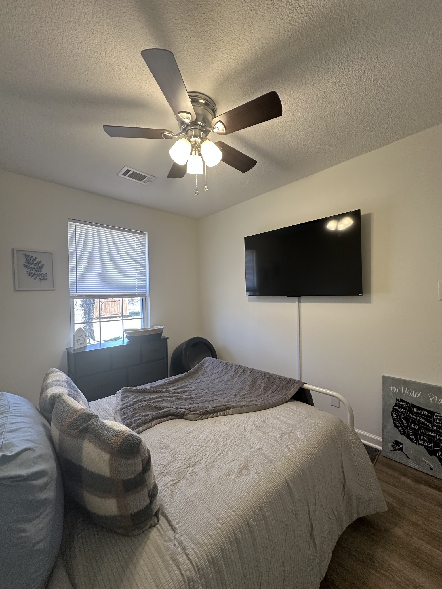 1027 Shadow Ridge Avenue Oak Grove, KY 42262 - Photo 12 of 14 a bedroom with a bed and a flat screen tv