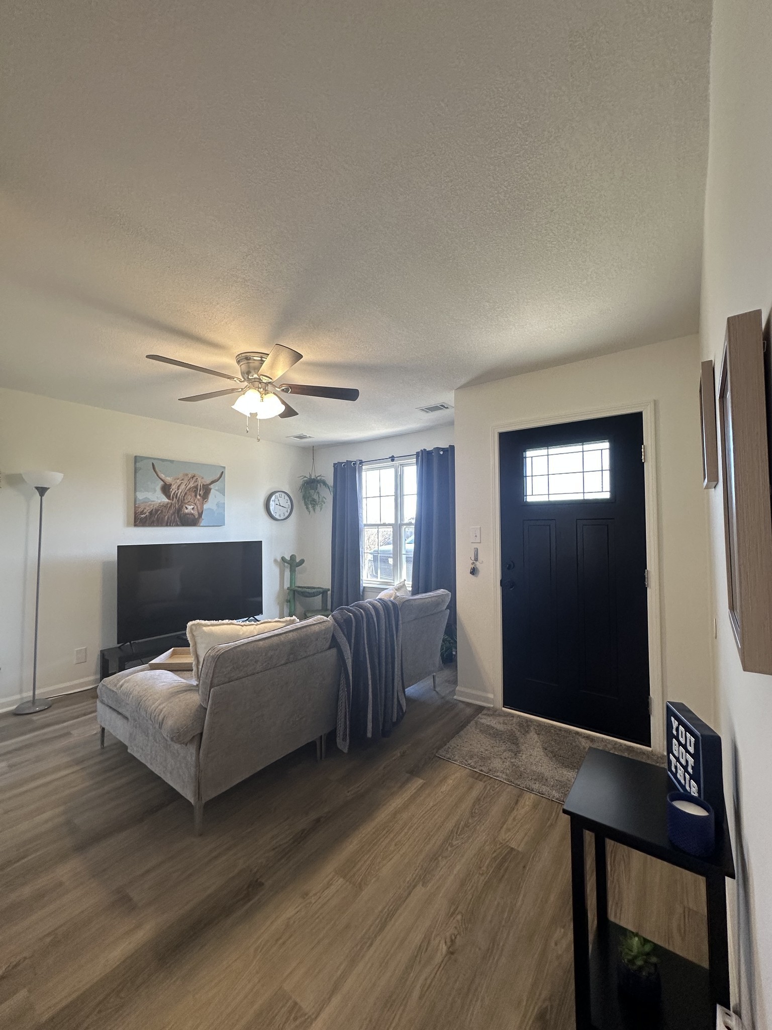 1027 Shadow Ridge Avenue Oak Grove, KY 42262 - Photo 2 of 14 a bedroom with a bed and wooden floor