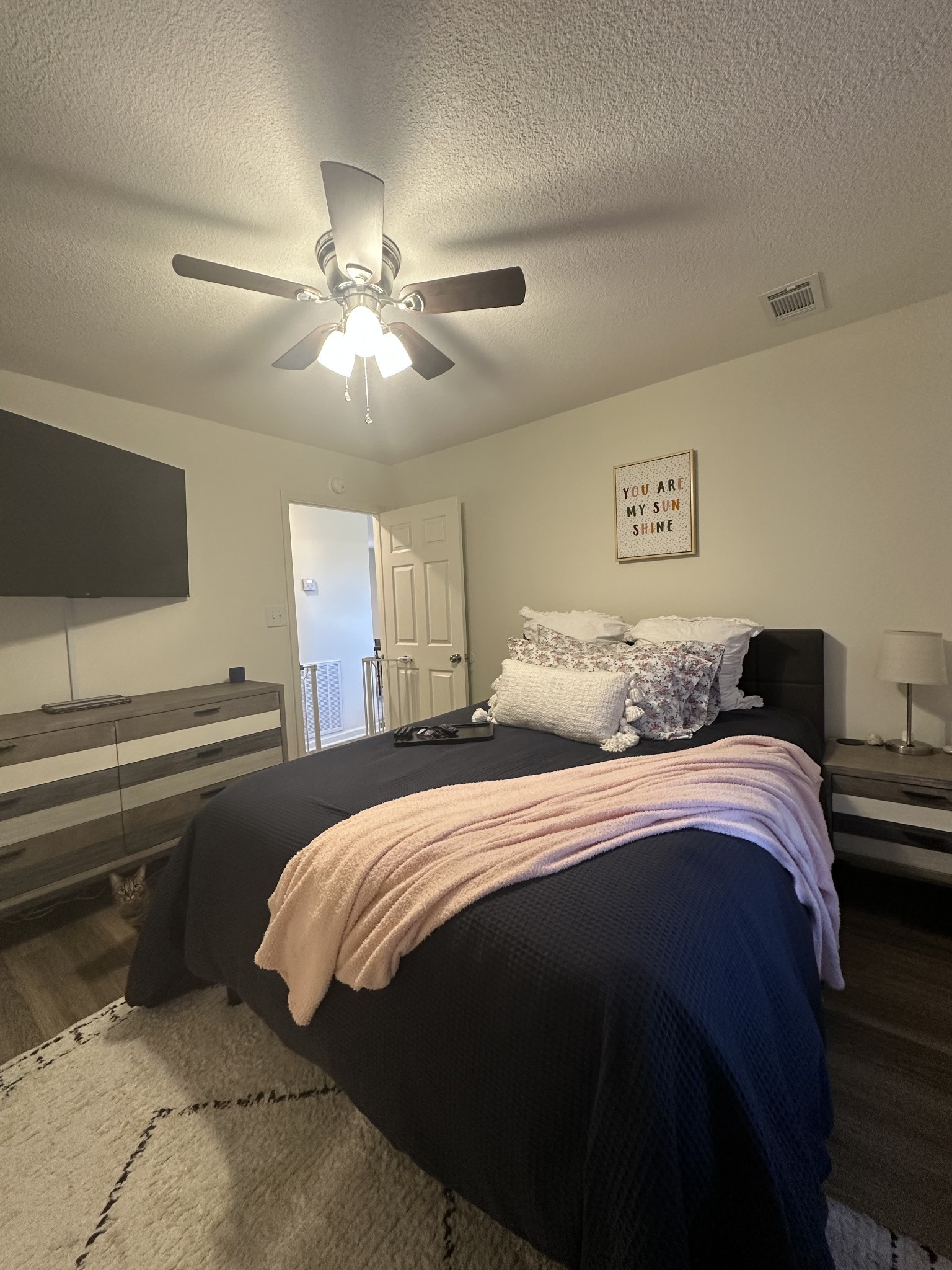 1027 Shadow Ridge Avenue Oak Grove, KY 42262 - Photo 9 of 14 a bedroom with a bed and a chandelier