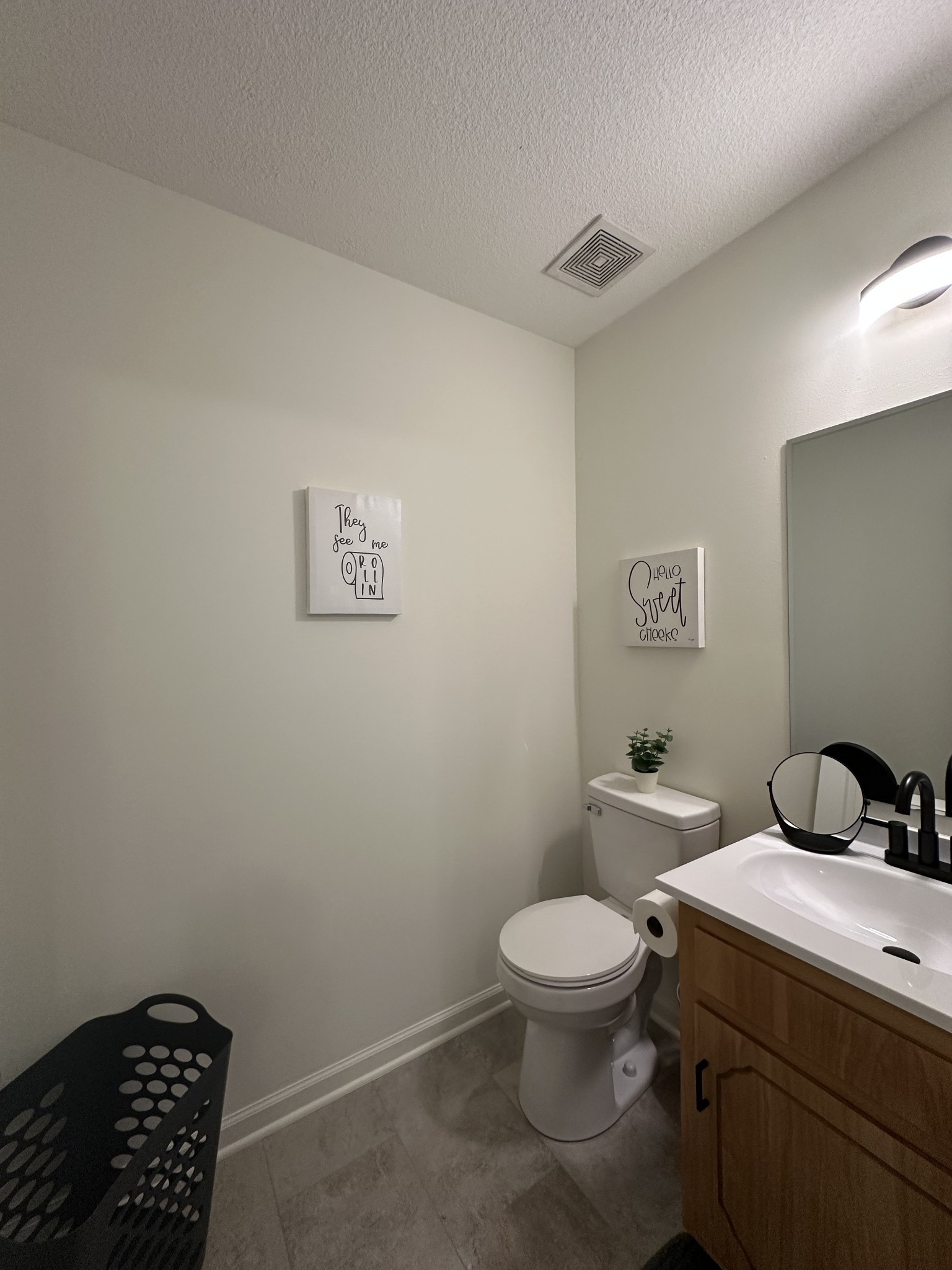1027 Shadow Ridge Avenue Oak Grove, KY 42262 - Photo 10 of 14 a bathroom with a toilet a sink and a mirror