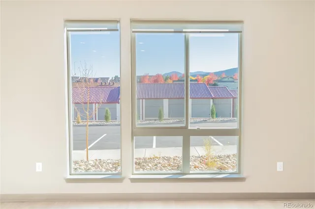 a view of a living room with a window