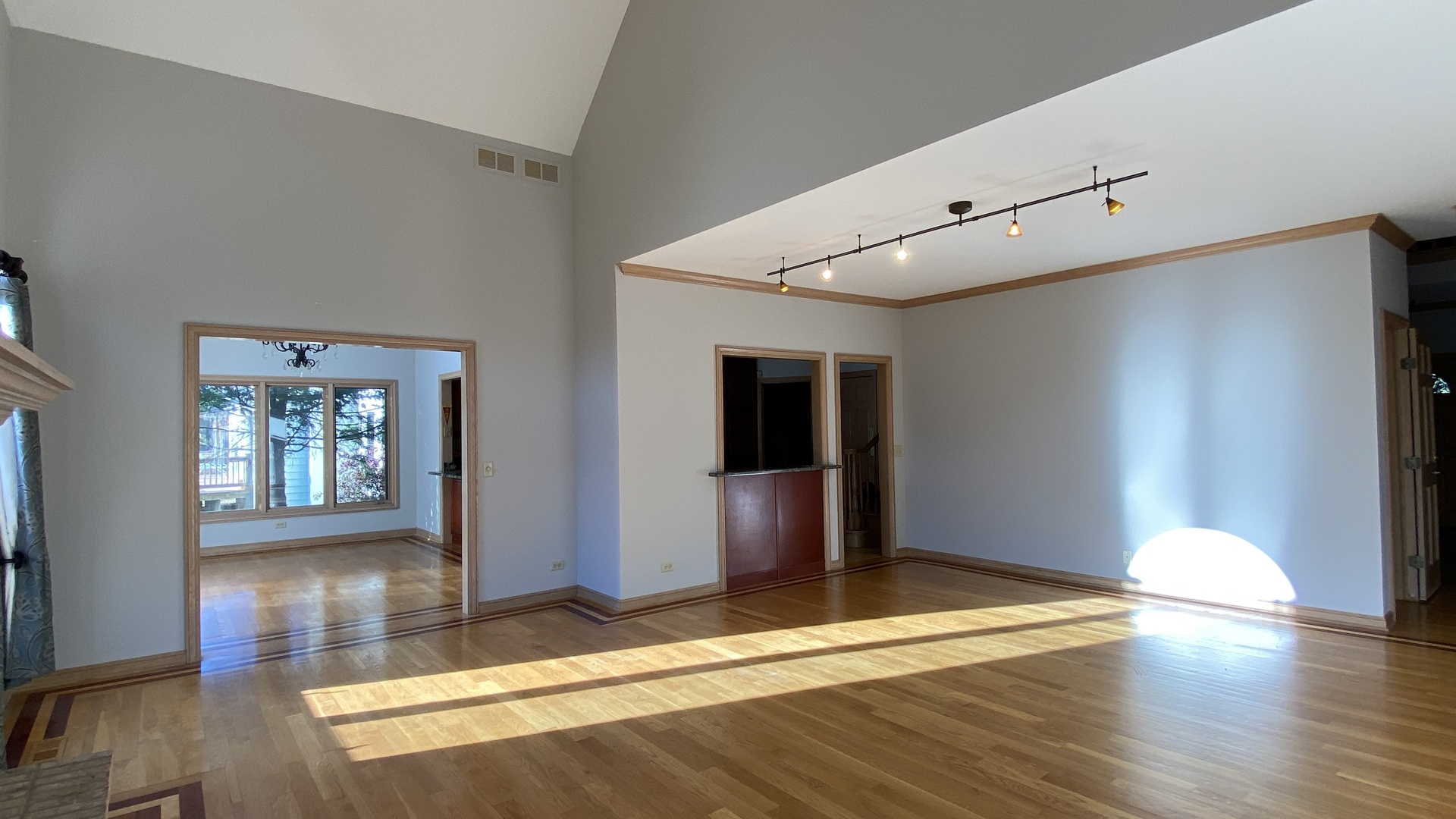 817 Turnbridge Circle Naperville, IL 60540 - Photo 14 of 42 a view of a livingroom with wooden floor