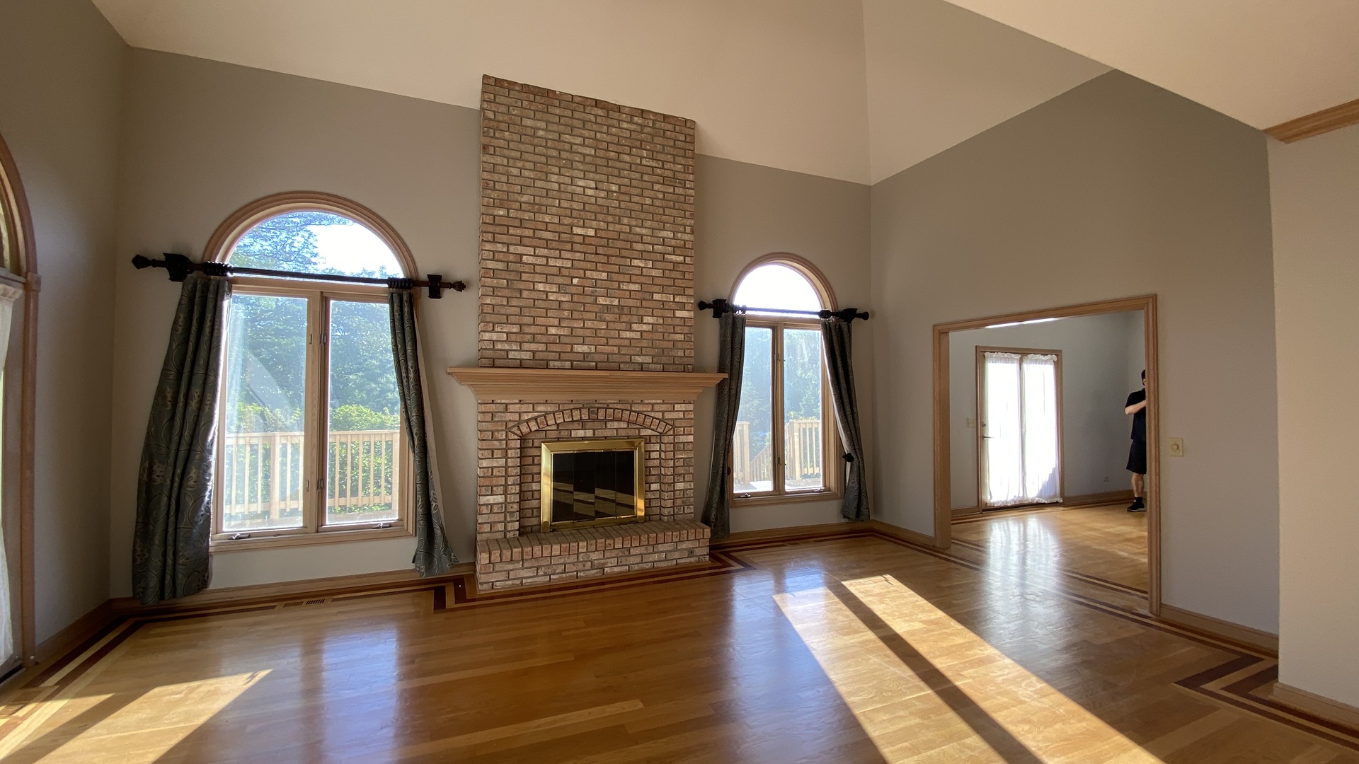 817 Turnbridge Circle Naperville, IL 60540 - Photo 15 of 42 a view of a livingroom with wooden floor and a fireplace