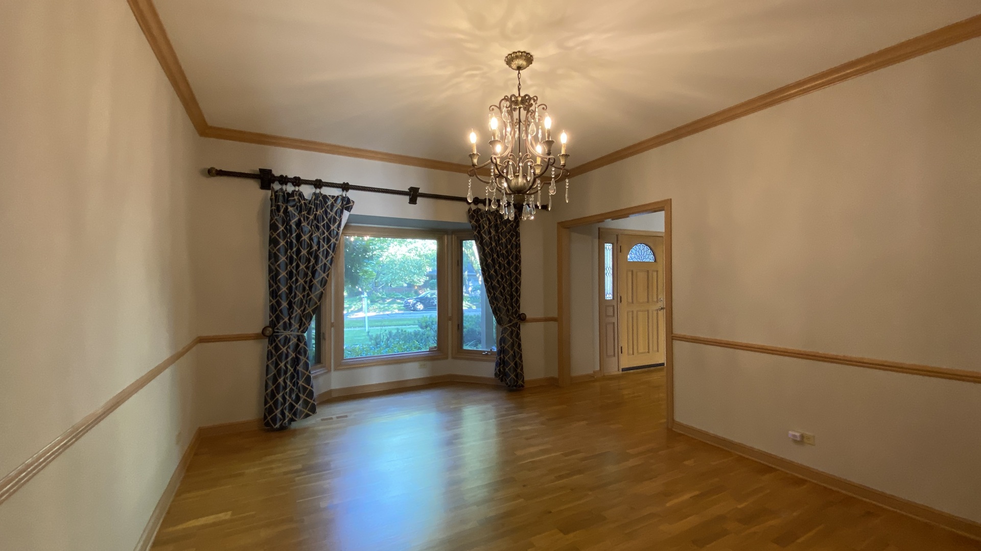 817 Turnbridge Circle Naperville, IL 60540 - Photo 23 of 42 a view of a room with wooden floor staircase and windows